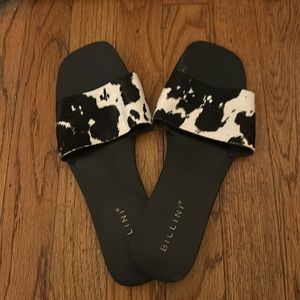 Black cowhide slides